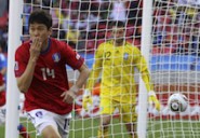 South Korea's Lee Jung-soo celebrates scoring a goal against Greece during their 2010 World Cup Group B soccer match at Nelson Mandela Bay stadium